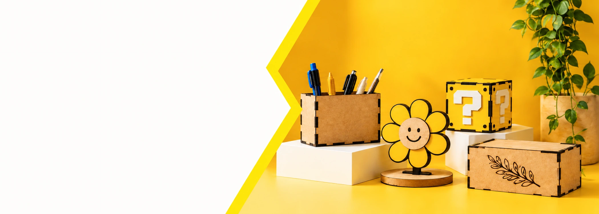 Produtos em MDF: organizador de mesa, flor decorativa, caixa amarela e caixa com gravação de folhas.